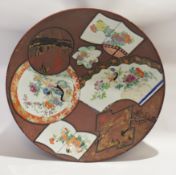 Exceptionally large Japanese porcelain charger, Meiji period, decorated in famille rose palette with