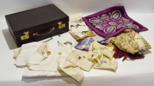 Rexine case containing various pieces of embroidery etc