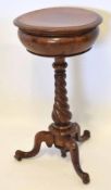 Victorian oak circular pedestal work table (possibly former tepoy) raised on a twisted support