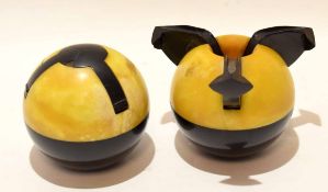 Pair of vintage Art Deco period two-tone Bakelite spherical ashtrays/cigarette holders with fold-out