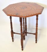 Edwardian inlaid octagonal occasional table, sectional top and folding support, 68cm wide