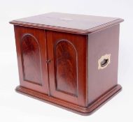 19th century mahogany specimen cabinet, moulded top and two arched panelled doors enclosing fitted
