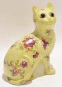 Galle style cat with glass eyes and floral decoration, 24cm high