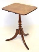 Early 19th century mahogany pedestal table, rectangular top with rounded corners raised on ring