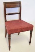 Set of four Regency period mahogany bar back dining chairs with ring turned front supports