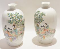 Pair of late 19th/early 20th century Chinese porcelain vases with polychrome decoration of figures