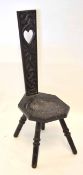 Late 19th/early 20th century dark oak correction or turner's chair, pierced back, moulded with