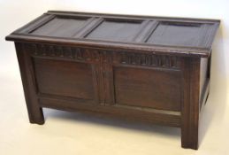 17th century oak coffer, three panelled top and two panelled front and void interior, 110cm wide