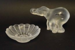 Lalique elephant and small tray with factory labels to side, the elephant 11cm long (2)