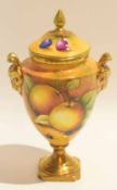 Coalport vase and cover decorated with fruit, signed H Harnett, 18cm high