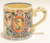 Burleigh ware George VI commemorative mug designed by Dame Laura Knight, 8cm high