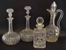 Group of three heavy cut glass decanters, one of square shape with diamond cut