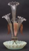 Victorian Vaseline tinted glass epergne, the central clear flute flanked by three others