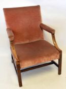 Early 19th century Gainsborough style mahogany armchair, plain back and slightly splayed arms raised