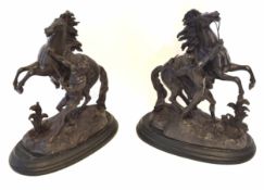 Pair of spelter models of Marley horses and their handlers after Coustou, 20cm high