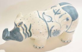 Rye Pottery model of a rhinoceros, the base signed David Sharpe, 42cm long