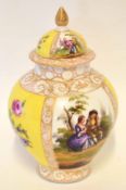 Continental porcelain vase and cover decorated in Meissen style with panels of floral sprays and