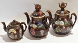 Group of three late 19th century/early 20th century barge ware tea pots comprising two large tea