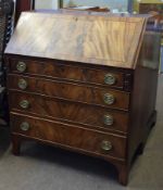 Early 19th century mahogany bureau, fall front enclosing a fitted interior, four graduated full