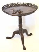 Early 19th century mahogany pedestal supper table with lattice pierced rim (losses etc) on a