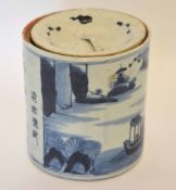 Chinese porcelain cylindrical jar and cover with blue and white design and inscription, 16cm high