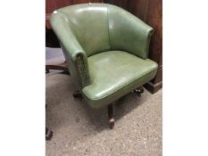 GREEN LEATHER UPHOLSTERED REVOLVING OFFICE CHAIR ON AN OAK QUATREFOIL BASE