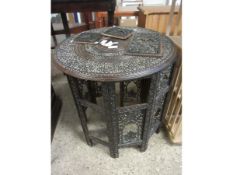 CIRCULAR CARVED TOP MOORISH TYPE TABLE WITH HEXAGONAL FOLDING BASE