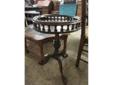 REPRODUCTION MAHOGANY CIRCULAR TABLE WITH GALLERIED EDGE WITH TURNED COLUMN ON A CARVED TRIPOD BASE