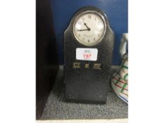 METAL FRAMED CLOCK WITH CIRCULAR DIAL STAMPED “FOREIGN” TOGETHER WITH A MANUAL BAIT CHANGE