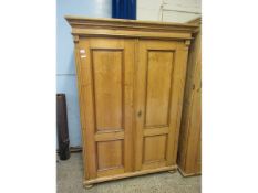 WAXED PINE DOUBLE DOOR WARDROBE ON BUN FEET