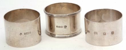 Mixed Lot: comprising three various cylindrical napkin rings, combined weight approx 95gms,