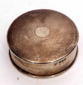 George V powder pot of cylindrical form, the domed cover with engine turned decoration and central