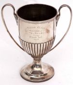 Edward VII half-fluted circular two-handled trophy cup with presentation inscription and raised on a