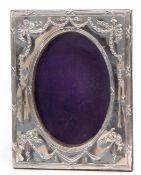 Edward VII silver mounted easel backed photograph frame, the rectangular mount with ribbon and