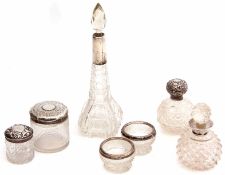 Mixed Lot: comprising five various silver mounted and clear glass toiletry bottles, together with