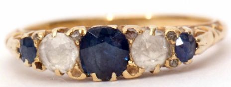 Early 20th century 18ct sapphire and white stone ring featuring three small graduated circular cut