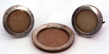 Mixed Lot: comprising two small silver mounted circular photograph frames with oak mounts and hinged