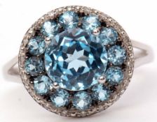 Modern 9ct white gold, blue topaz and small diamond cluster ring, size N