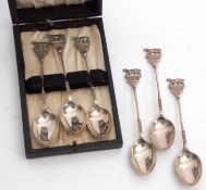 Mixed Lot: comprising six cased George V coffee spoons, each with cast finials of a walking