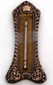 Edward VII silver mounted desk thermometer, the embossed foliate mount with vacant cartouche