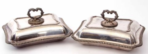 Two early 20th century electro-plated serving dishes, each of shaped rectangular form with wrythen