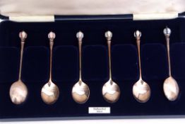 Elizabeth II cased set of six coffee spoons, each with polished bowls, plain tapering stems and each