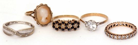 Mixed Lot: five modern 9ct stamped dress rings to include a cameo ring, a small diamond set ring,