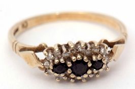 9ct gold diamond and sapphire cluster ring featuring three small circular cut sapphires within a