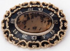 Large Victorian gold filled memoriam brooch, black enamel ground with a moss agate central panel,