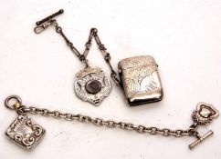 Mixed Lot: comprising a hallmarked silver vesta case of rectangular form with hinged and sprung