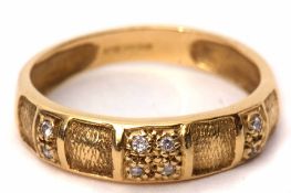 18ct gold and diamond ring, of textured design highlighted with six small diamonds, 2.9gms, size O