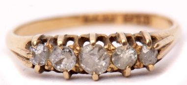 Five-stone diamond ring featuring five graduated old cut diamonds, claw set and raised in a