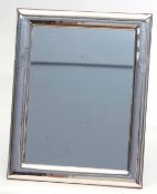 Modern silver foiled easel backed dressing table mirror of polished rectangular form with plain