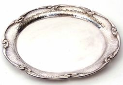 Early 20th century electro-plated salver with shaped Art Nouveau style border and hammered rim to